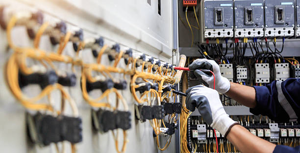 Professional Electrician technician working in Methuen Town, MA